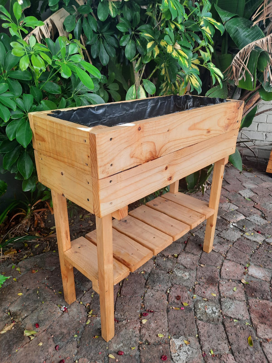 Raised Planter with Storage Facility